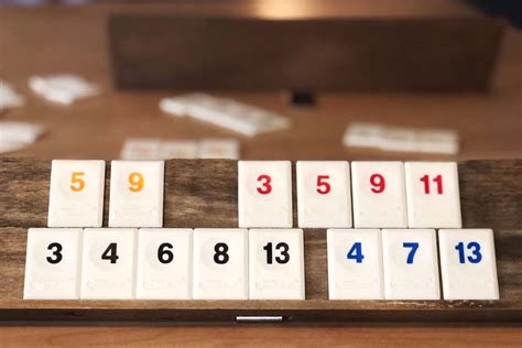 Sep 26, 2023 · Setting Up Rummikub. Put the tiles in the pouch and mix them up. Each player should pick a tile. The person with the highest number will go first. Put the tiles back in the pouch and mix them up. Give each player a rack. Each player will pull 14 tiles from the pouch and put them on their rack. 